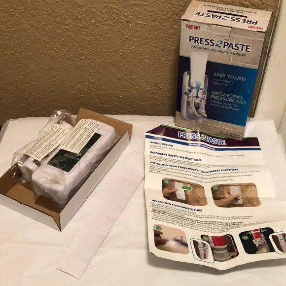 New in Box Press2Paste Hands Free Toothpaste Dispenser. Never used. Bonus holder - Picture 7 of 16